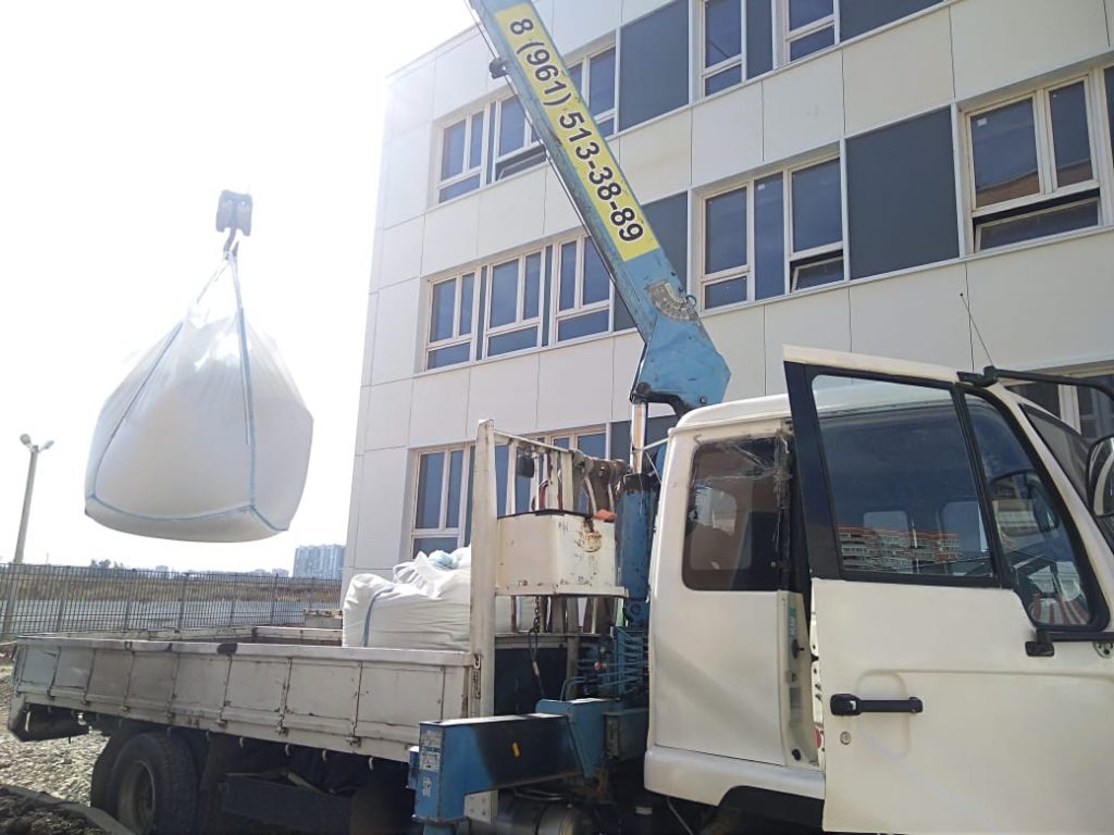 Перевозка краном-манипулятором цемента